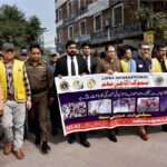 President Lions Club Allama Iqbal and District Governor Lions Club Faizan Kapur, along with others took part in the smog awareness walk
