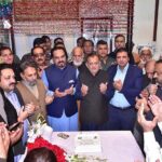 Chamber of Commerce Executive Body Members Chairman Committee Syed Shahbaz Ibn Iqbal, Shehbaz Saim, former District Nazim Mian Naeem Javed praying during cake cutting ceremony to mark the 146th birth anniversary of National Poet, Dr. Allama Muhammad Iqbal at Mazar-e-Iqbal