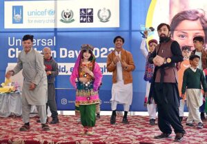 Special children's performing on national song during an event organized in connection with World Children Day at Special Education Complex Hayatabad