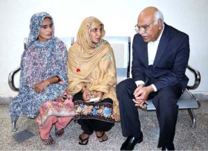 Chairperson Benazir Income Support Program (BISP), Dr. Muhammad Amjad Saqib interacting with women beneficiaries of BISP at BISP office