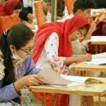 Students are solving their question papers during Pre entry test for admission in the Liaquat University of Medical & Health Sciences (LUMHS)