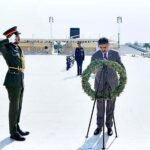 The Caretaker Prime Minister Anwaar-ul-Haq Kakar lays a floral wreath at Martyrs' memorial at Wahat al Karama