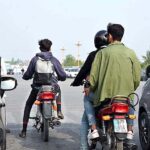 Bike rider is riding a bike without number plate and not wearing the helmet may cause any accident and needs attention of the concerned authorities in the Federal Capital at Jinnah Avenue.