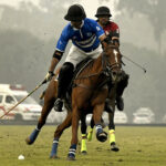 Players struggling to get hold on the ball during Final match between Diamond Paints VS Remounts for Patrons Aibak Polo Cup 2023 at Lahore Polo Club