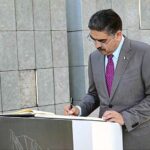 The Caretaker Prime Minister Anwaar-ul-Haq Kakar records his comments in the guest book at Wahat al Karama.