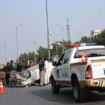 A view of damaged car due to accident in the Federal Capital at Jinnah Avenue.