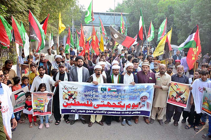 Workers of Majlis Wehdat-e-Muslimeen participating in a solidarity rally in support of Palestinians at SSP Office Road