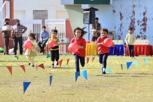 Children participating in running competition during Annual Sports Gala 2023-24 of The City School at Hayatabad Sports Complex