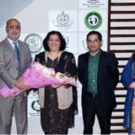 Shafqat Abbas Joint Secretary, Ministry of I&B presenting a bouquet to newly appointed Federal Secretary Information & Broadcasting Ms. Shahera Shahid upon her taking over charge of the office of the Secretary