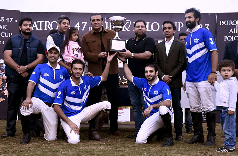 Players struggling to get hold on the ball during Final match between Diamond Paints VS Remounts for Patrons Aibak Polo Cup 2023 at Lahore Polo Club