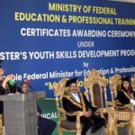 Caretaker Federal Minister for Education and Professional Training Madad Ali Sindhi is addressing the students in the auditorium of University of Lahore