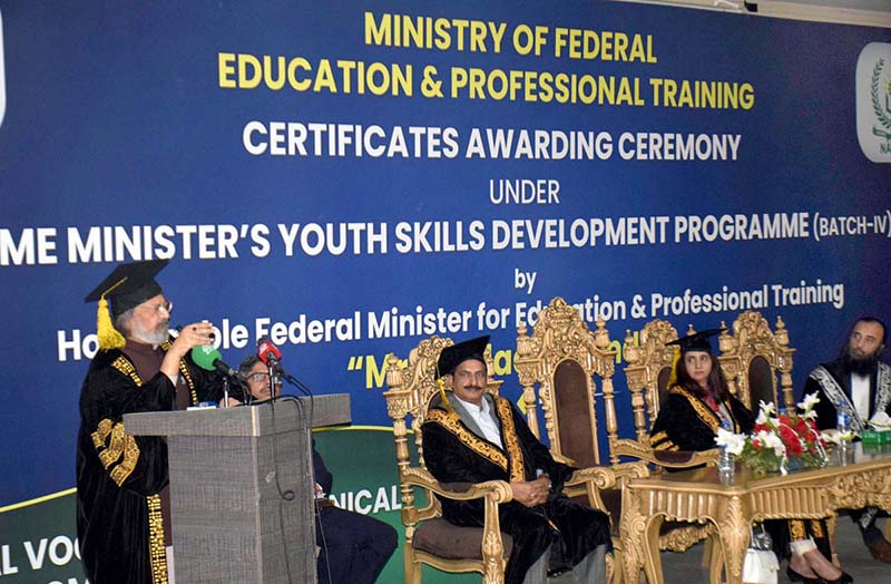 Caretaker Federal Minister for Education and Professional Training Madad Ali Sindhi is addressing the students in the auditorium of University of Lahore