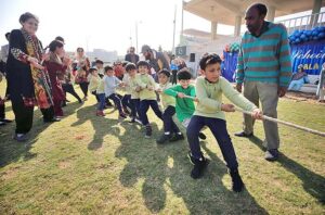 Children participating in running competition during Annual Sports Gala 2023-24 of The City School at Hayatabad Sports Complex
