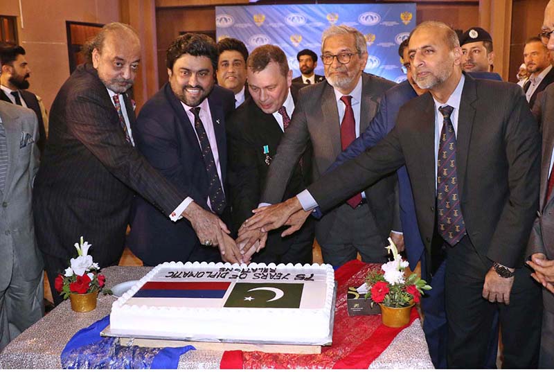 Governor Sindh Kamran Khan Tessori along with Caretaker Sindh Chief Minister Justice (R) Maqbool Baqar ,Consul General of Russian Federation Karachi, Andrey V. Fedorov and others Jointly Cutting Cake during People's Unity Day Ceremony at the Russian Consulate.