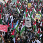 A large number of people participating in a motorbike rally to show solidarity with Palestinians organized by Jamat e Islami from Numaish to Teen Talwar