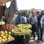 Caretaker Sindh Chief Minister Justice (R) Maqbool Baqar inspects rate lists at Shah Faisal Colony near Jamia Malia Block-3, District Korangi.