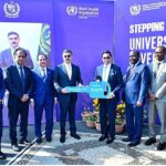 Caretaker Prime Minister Anwaar-ul-Haq Kakar receives a key signifying the provision of multiple mobile health units to the Government of Pakistan by WHO