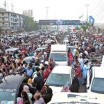 Parents of students waiting outside Expo Centre as the Medical and Dental College Admission Test (MDCAT) 2023-24 is being held.