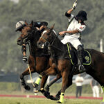 Players struggling to get hold on the ball during polo match played between FG Din polo vs DS Polo Sheikhoo Steel during Patrons Aibak Cup 2023