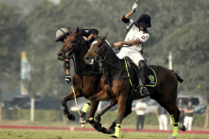 Players struggling to get hold on the ball during polo match played between FG Din polo vs DS Polo Sheikhoo Steel during Patrons Aibak Cup 2023