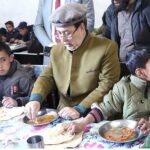 Governor Gilgit-Baltistan Syed Mehdi Shah having lunch with children of Sweet Home during his visit