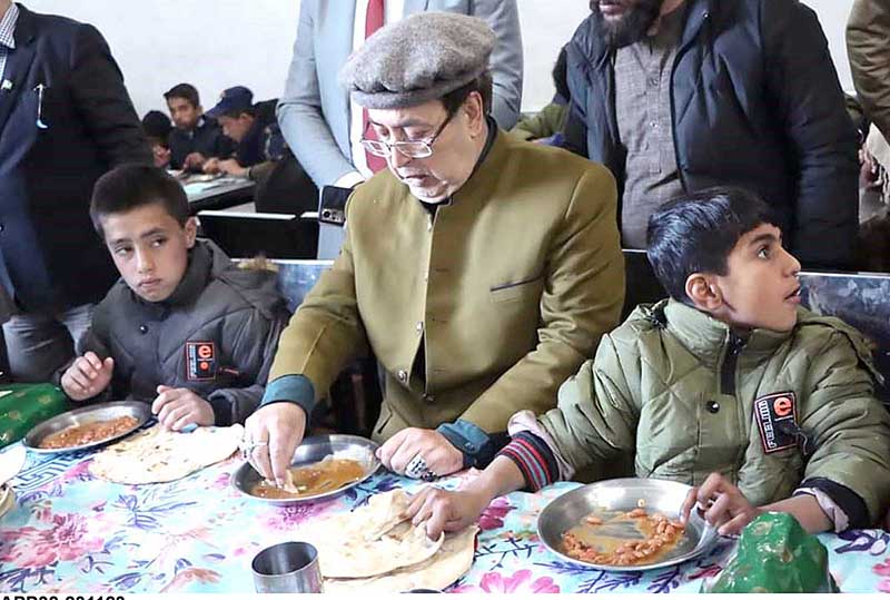 Governor Gilgit-Baltistan Syed Mehdi Shah having lunch with children of Sweet Home during his visit