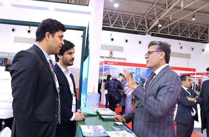 Ambassador of Pakistan to China H.E. Khalil Hashmi interacting with Pakistan's tourism exhibitors at Pakistan Pavilion at the China Outbound Travel and Tourism Market (COTTM) Expo-2023, held at the China National Agriculture Center.