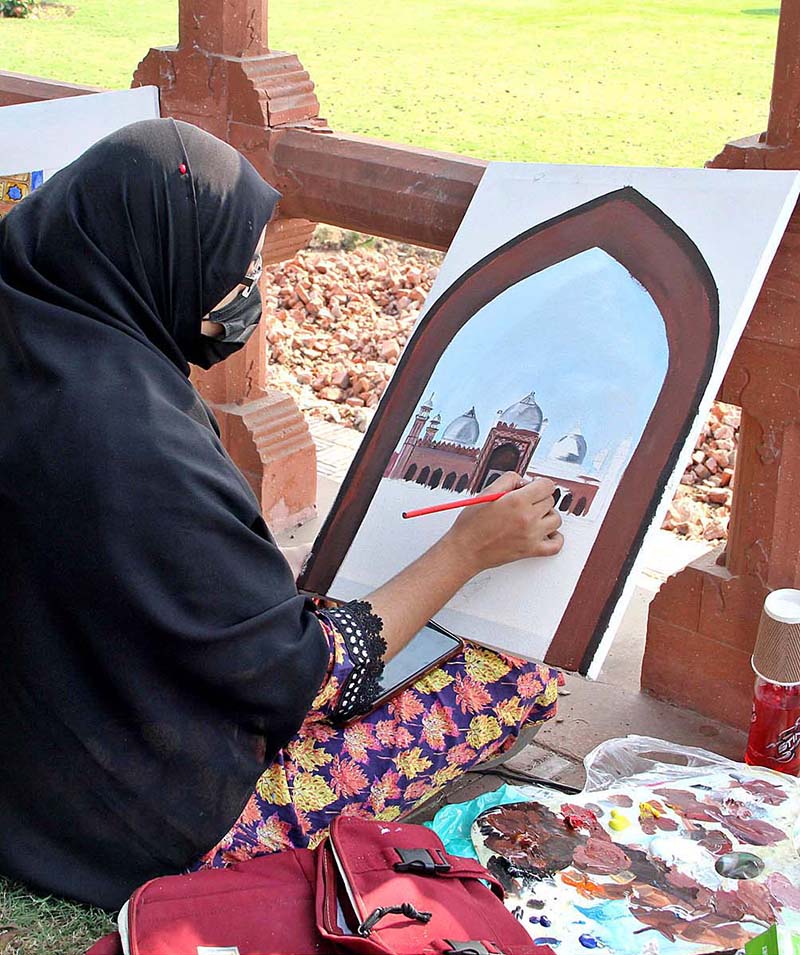 Artist giving final touch to painting in Dewane Aam Painting Competition inside Shahi Fort in collaboration with Bab Pakistan Foundation and Walled City Authority Lahore