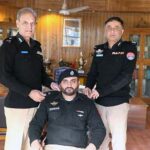 Inspector General of Police Gilgit-Baltistan Afzal Mehmood Butt pining promotion badges of SP to Zeeshan Brohi at CPO