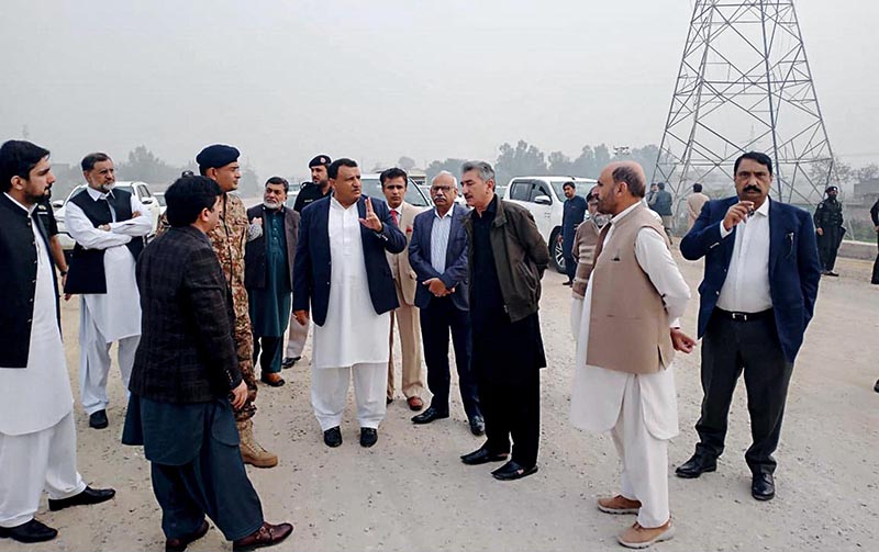 Brig. (Retd.) Muzaffar Ali Ranjha, Chairman, PMIC's is getting site visit briefing on PSDP project titled "Peshawar Northern Bypass" from the NHA officers and Contractor