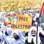 Students of different Schools and Colleges hold placards during a pro-Palestinian rally organized by the Private Education Network Gilgit-Baltistan