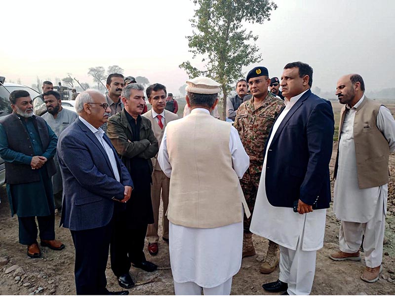 Brig. (Retd.) Muzaffar Ali Ranjha, Chairman, PMIC's is getting site visit briefing on PSDP project titled "Peshawar Northern Bypass" from the NHA officers and Contractor