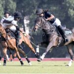 Players struggling to get hold on the ball during polo match between FG DIN Polo and Newage Cables Master Paints during Patrons 47th Aibak Cup 2023 at Lahore Polo Club. FD DIN polo team won the match by 8-4