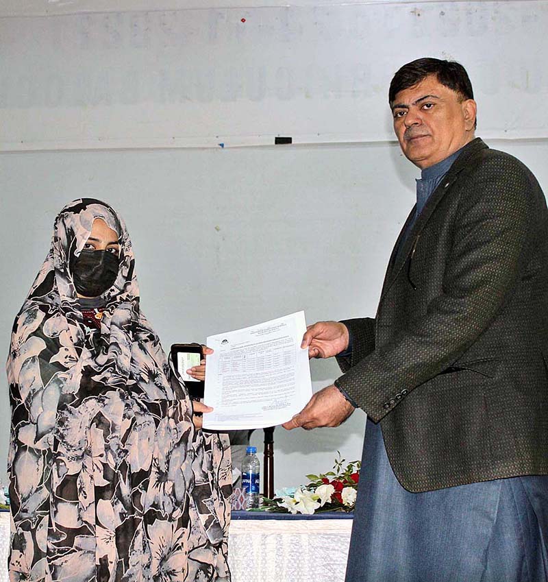 Balochistan Caretaker Minister for Education Dr. Qadir Bakhsh Baloch distributing appointment orders on deceased quota in education department.