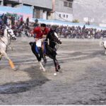 Players from Leopards and Gilgit-01 teams in action during the final match of the Jashan-e-Azadi free polo tournament at Aga Khan Shahi polo ground. APP/AHS/FHA/ZID