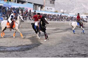 Players from Leopards and Gilgit-01 teams in action during the final match of the Jashan-e-Azadi free polo tournament at Aga Khan Shahi polo ground. APP/AHS/FHA/ZID