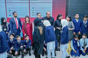 The Caretaker Prime Minister Anwaar-ul-Haq Kakar interacts with the children on the eve of Universal Children's Day