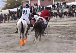 Players from Leopards and Gilgit-01 teams in action during the final match of the Jashan-e-Azadi free polo tournament at Aga Khan Shahi polo ground. APP/AHS/FHA/ZID