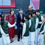 The Caretaker Prime Minister Anwaar-ul-Haq Kakar interacts with the children on the eve of Universal Children's Day