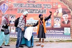 Shiromani Gurdwara Parbandhak Committee (SGPC) Amritsar Jatha Leader Khushminder Singh talking to media persons after arriving in Pakistan through Wagha Border to participate in religious rituals on the occasion of 554th Birth Anniversary of Guru Nanak at Nankana Sahib