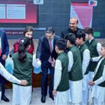 The Caretaker Prime Minister Anwaar-ul-Haq Kakar interacts with the children on the eve of Universal Children's Day