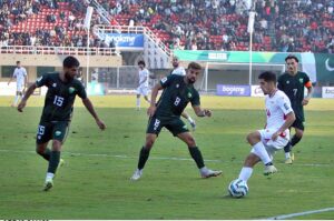 Players in action during 2026 FIFA World Cup qualifier football match between Pakistan and Tajikistan at Jinnah Sports Stadium
