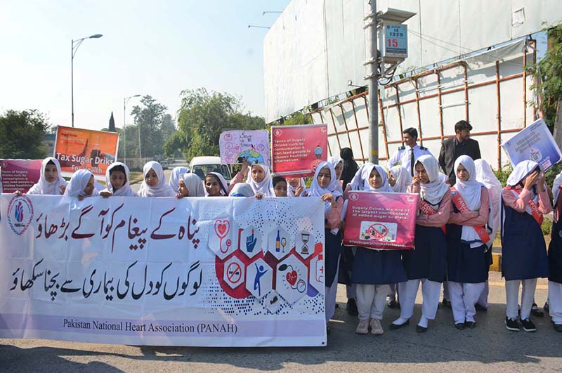 A large number of students participating in an awareness walk regarding Diabetes on the eve to mark World Diabetes Day organized by Pakistan National Heart Association at National Press Club Islamabad