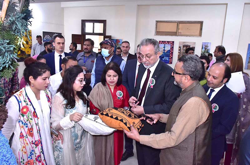 Ambassador of the Republic of Turkey to Pakistan Professor Dr. Mehmet Pachaji and Vice Chancellor Prof. Dr. Zareen Fatima Rizvi, Guest of Honor Education Consul Mehmet Twiran are viewing of painting exhibition on the hundrad years of Magnitude centenary of Pak - Turk Affinity at GC Women University