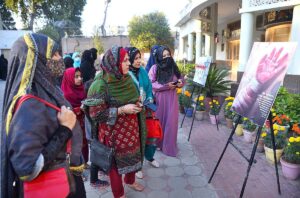 Director General of Khana Farhang Iran Dr. Hussain Chaqmi, Provincial ombudsperson Rukhshanda Naz and ANP provincial president Samar Bilour taking interest in display stuff during an exhibition & conference held at Khana Farhang Iran in connection with International day of violence against women and highlighted plights of women and children in Gaza.