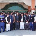 Chairperson Benazir Income Support Program (BISP), Dr. Muhammad Amjad Saqib photographed with BISP employees during his visit to Jamia Masjid Eidgah.