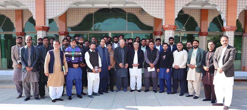 Chairperson Benazir Income Support Program (BISP), Dr. Muhammad Amjad Saqib photographed with BISP employees during his visit to Jamia Masjid Eidgah.