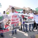 Students of Aisha Bawany Academy holding a protest demonstration in support of Palestinians at Shahrah-e-Faisal