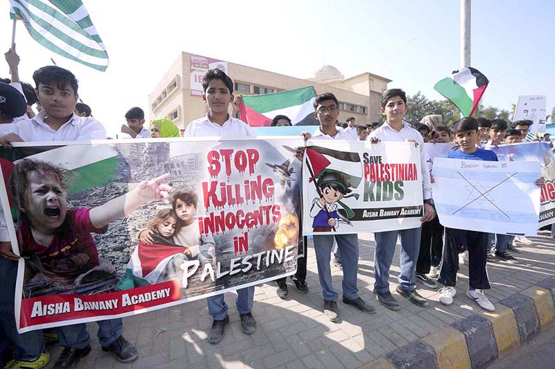 Students of Aisha Bawany Academy holding a protest demonstration in support of Palestinians at Shahrah-e-Faisal