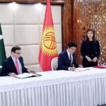 Caretaker Minister for Energy, Muhammad Ali signing an agreement between the Centre for the Development of Halal Industry Kyrgyzstan and Pakistan Standards and Quality Control (PSQCA)